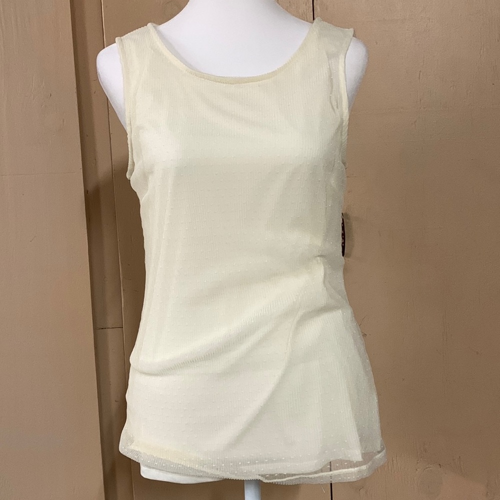 Banana Republic size small cream color sleeveless blouse.